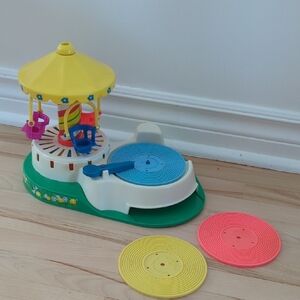 Vintage Fisher Price Colorful Carousel Music Toy